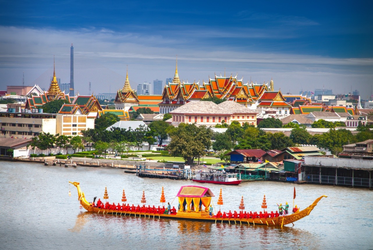 Royal Boat and river with grand palace background in Bangkok city